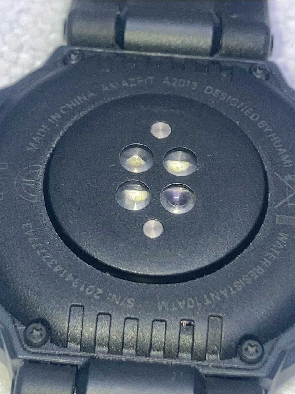 Rugged Black Smartwatch with Pink-Accented Dial